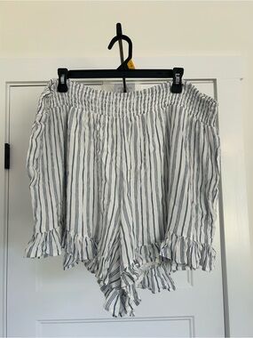 Black Tape_ White Shorts with Navy Vertical Stripes and Ruffle Hem